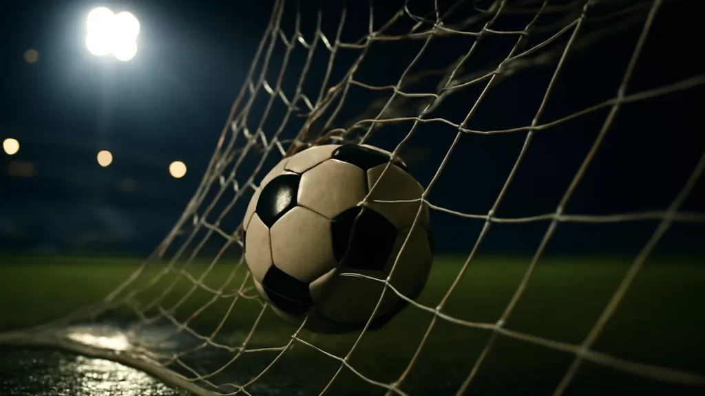 Sam Kerr makes history as Gotham beat Kansas City 2-1 Football caught in goal net under floodlights, wet pitch and blurred stands